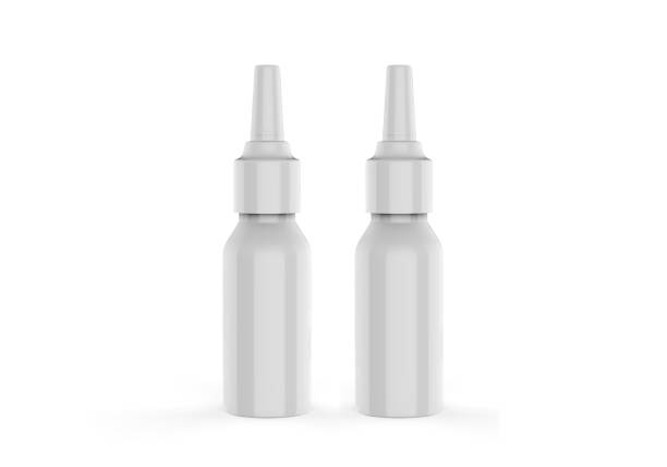istock White blank plastic nasal drops bottle with dispenser pump, mock up template on isolated white background, 3d illustration 1204379751
