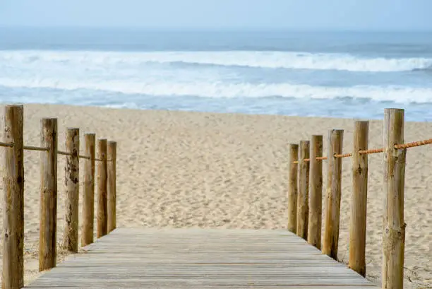 wooden walkway to access the beach of Esmoriz in Portugal