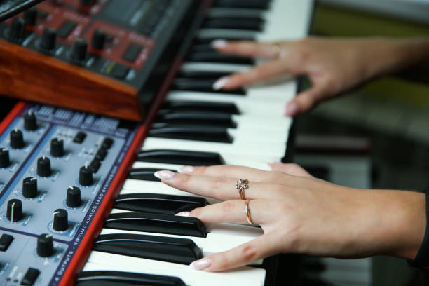 istock hands of a woman are adjusting mixer 1204379940