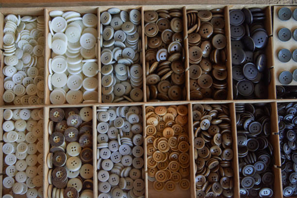 istock drawer with many different buttons, crafts hobbies sewing handmade 1204382862