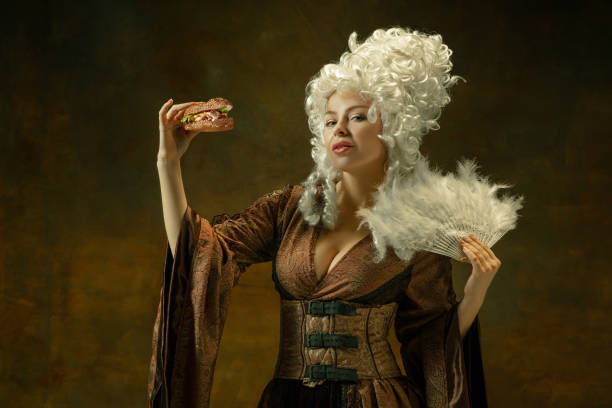 istock Medieval young woman in old-fashioned costume 1204387368