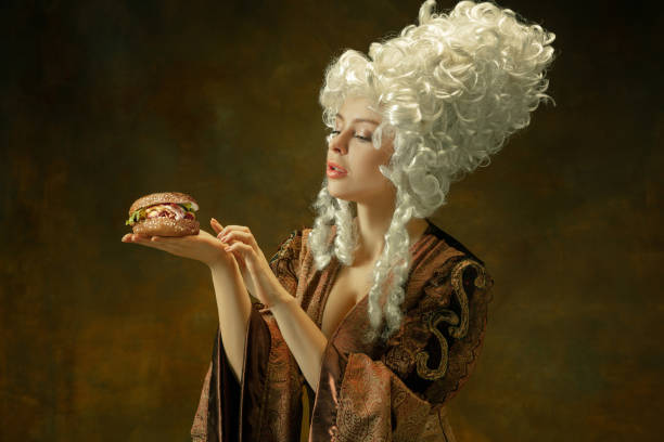istock Medieval young woman in old-fashioned costume 1204387369