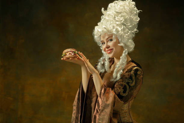 istock Medieval young woman in old-fashioned costume 1204387371