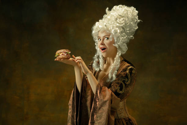 istock Medieval young woman in old-fashioned costume 1204387372