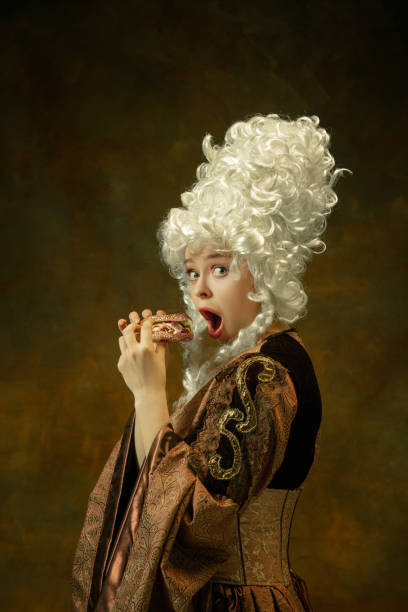istock Medieval young woman in old-fashioned costume 1204387376