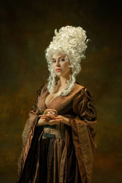 istock Medieval young woman in old-fashioned costume 1204387387