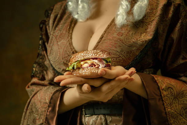 istock Medieval young woman in old-fashioned costume 1204387389