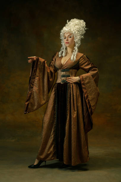 istock Medieval young woman in old-fashioned costume 1204387427