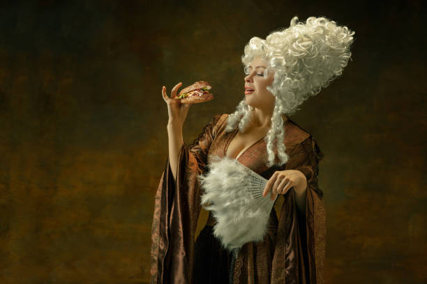 istock Medieval young woman in old-fashioned costume 1204387590