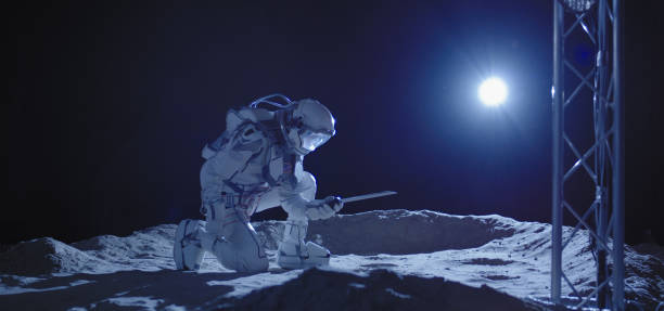 istock Astronaut kneeling on the Moon 1204388757