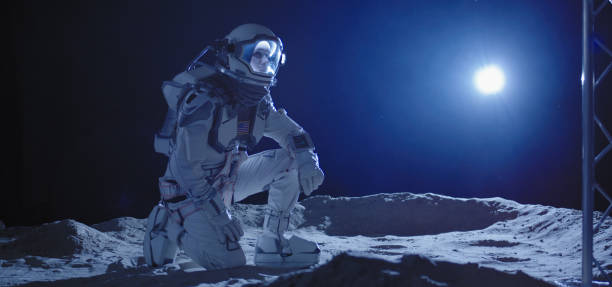 istock Astronaut kneeling on the Moon 1204388778