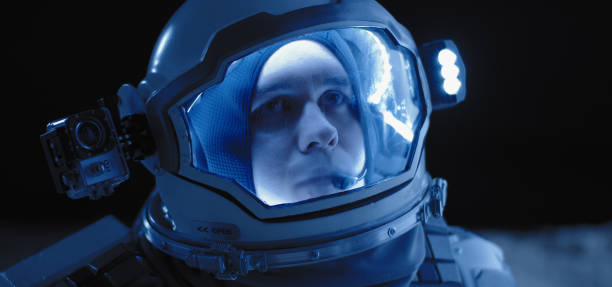 istock Astronaut on the Moon looking around 1204388854