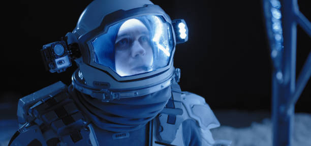 istock Astronaut on the Moon looking around 1204388967
