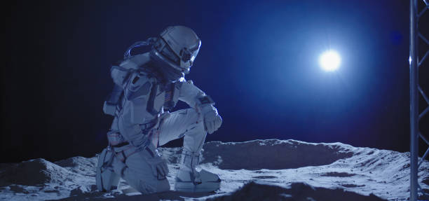 istock Astronaut kneeling on the Moon 1204389006