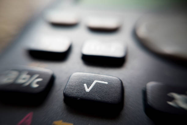 istock Calculator buttons macro shot details 1204390903