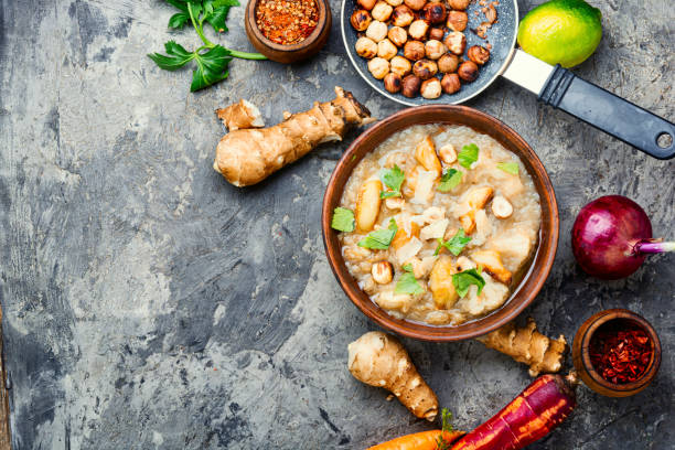 Vegetarian cream soup Cream soup of Jerusalem artichoke and cauliflower.Healthy and diet food Artichoke stock pictures, royalty-free photos & images