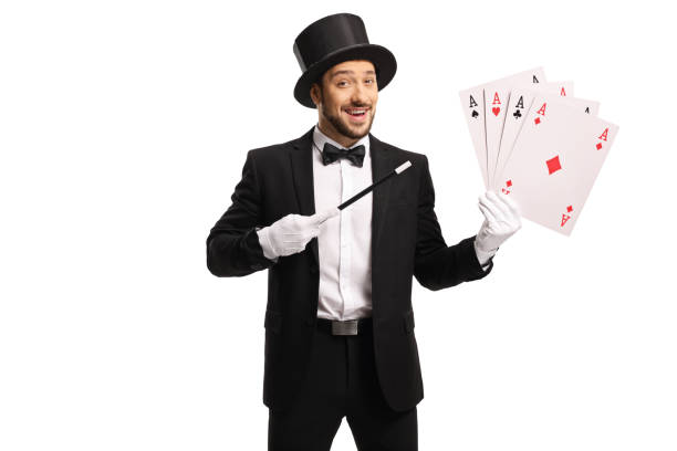 istock Cheerful magician with a magic wand and 4 aces 1204393566