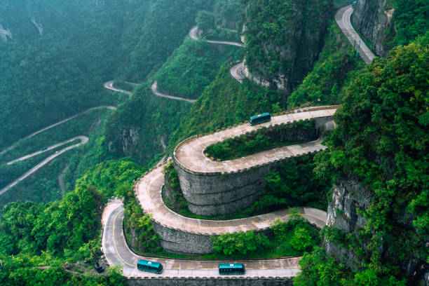 istock windy Mountain road in China 1204393731