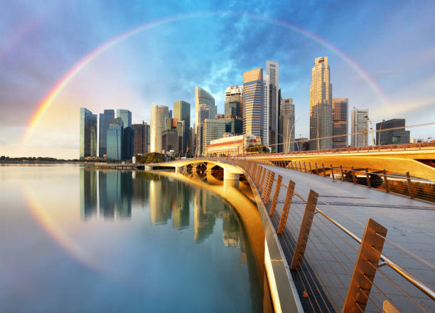 quartiere degli affari di singapore con arcobaleno - singapore city foto e immagini stock