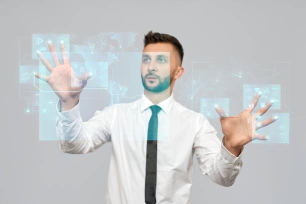 istock Smart businessman touching virtual 3D icon. 1204395260