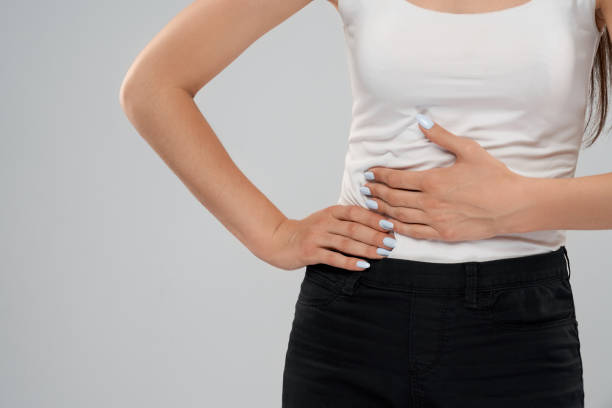 istock Woman suffering from pain in liver. 1204396840