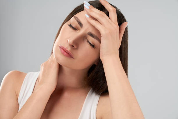 istock Woman showing headache. 1204396916