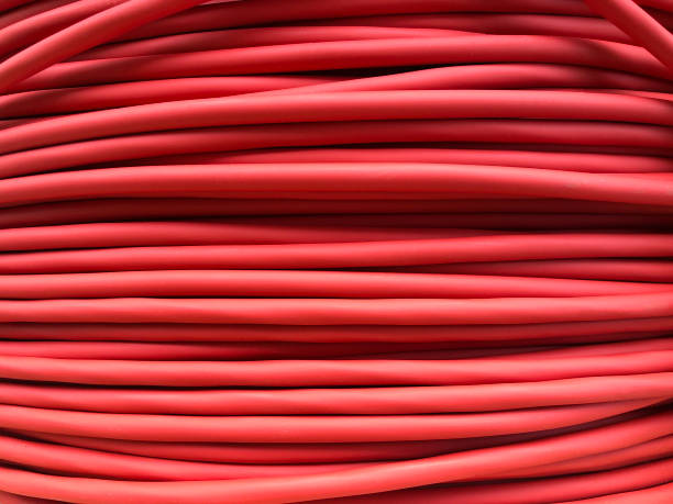 istock red coiled electrical cable on the wooden spool 1204398500