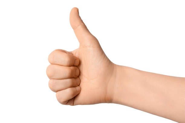 istock Male hand with thumb showing success, isolated on a white background 1204399293