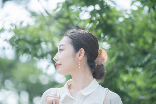 istock young woman goes to work 1204401515
