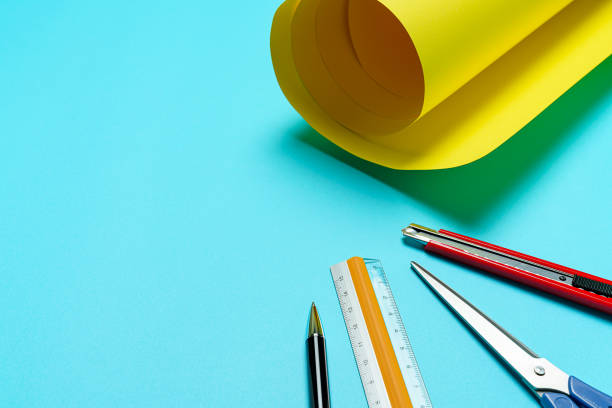 istock Construction paper, scissors, cutter knife, ruler, and pen 1204402626