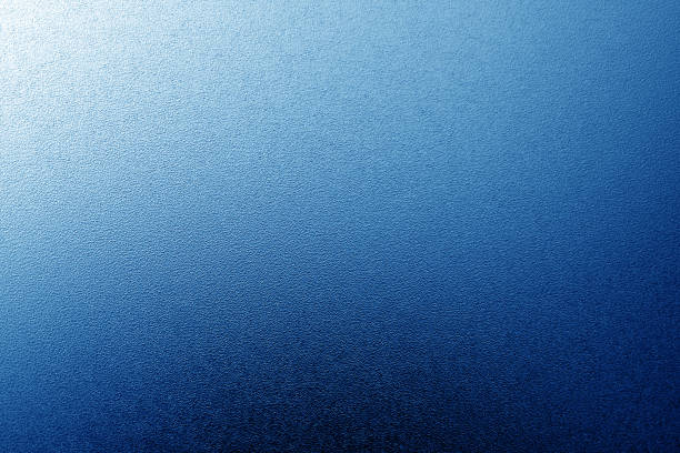 istock Ground glass texture with light with blur effect in navy blue tone. 1204403203