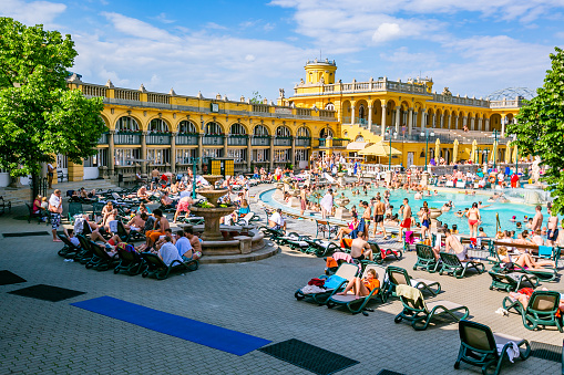 Budapest,Hungary 02 May 2019 :People have a thermal bath in the Szechenyi spa. Szechenyi Medicinal Bath is the largest medicinal bath in Europe.