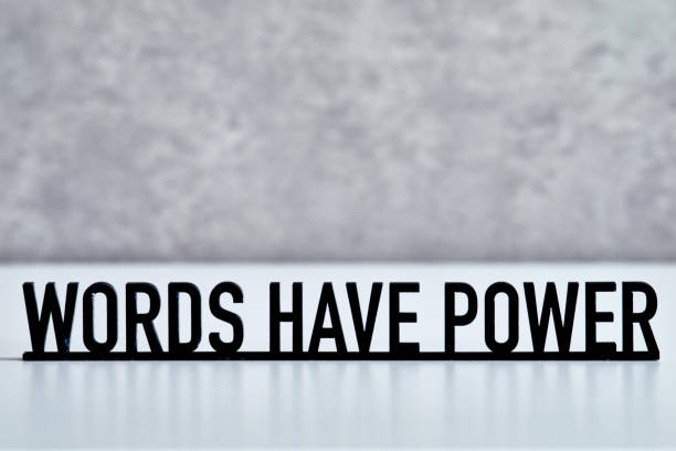 Phrase WORDS HAVE POWER on gray background Phrase WORDS HAVE POWER on gray background single word stock pictures, royalty-free photos & images