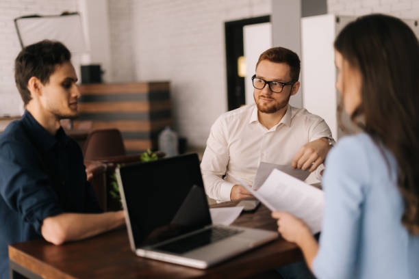 istock Young business team are brainstorming sharing ideas at office meeting 1204408285