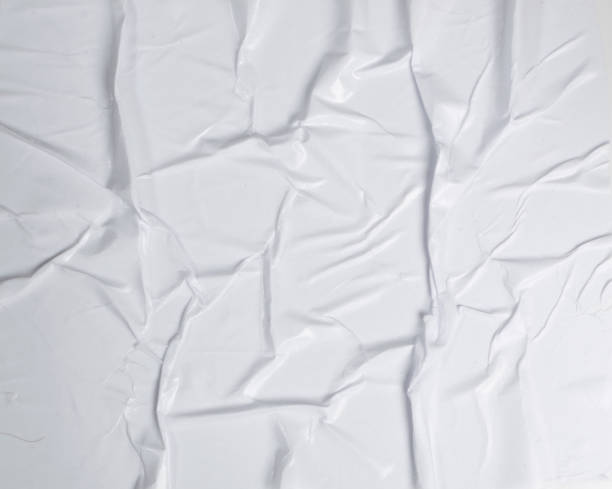 istock White Glued Paper Texture with Creases Surface Grunge Effect 1204411413