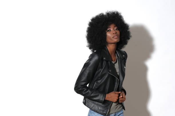 istock High fashion afro-american model in black leather jacket. 1204412843