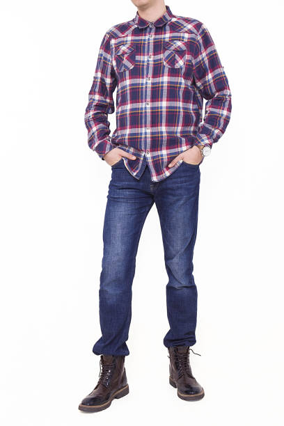 istock Handsome and confident young man wearing shirt while standing on white background. 1204412845