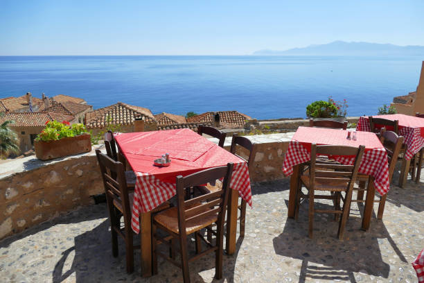 istock Tables of a restaurant with a beautiful view in Monemvasia 1204417436