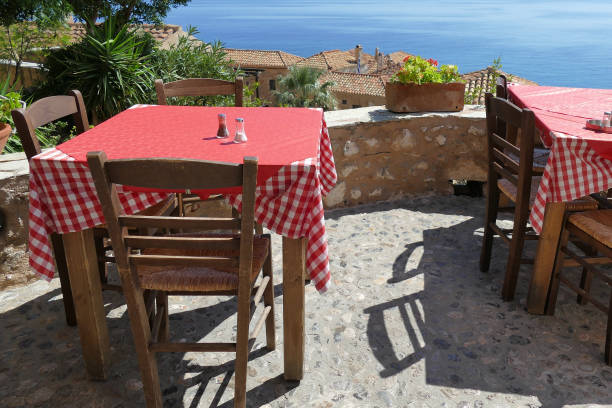 istock Tables of a restaurant with a beautiful view in Monemvasia 1204417437