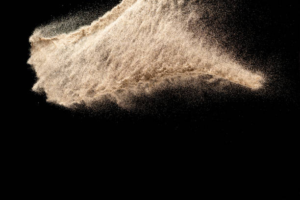 istock Dry river sand explosion isolated on black background. Abstract sand cloud.Brown colored sand splash. 1204417609