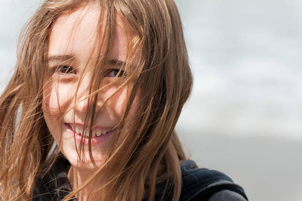 istock Close up a a happy smiling girl 1204418173