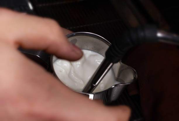 istock Making coffee in coffeeshop or cafe closeup 1204418996