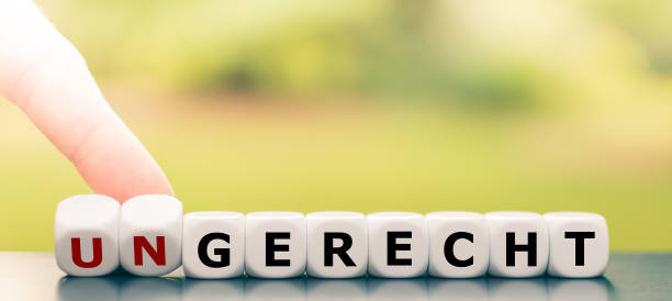 istock Hand turns dice and changes the German word 