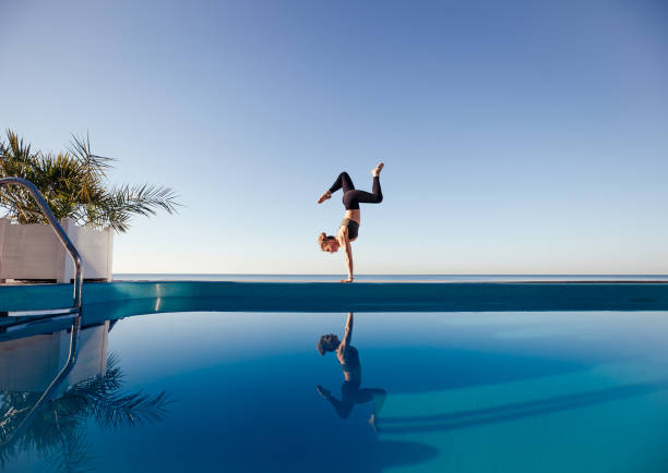 istock Young attractive woman practicing yoga 1204420076