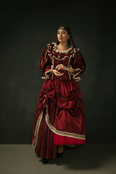istock Medieval young woman in old-fashioned costume 1204420351