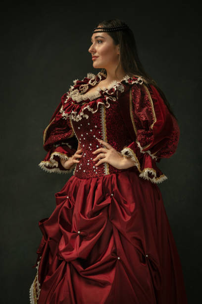 istock Medieval young woman in old-fashioned costume 1204420366