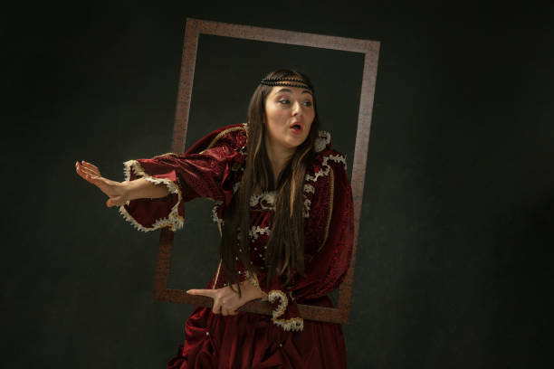 istock Medieval young woman in old-fashioned costume 1204420561