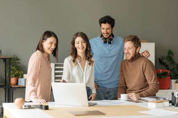 istock Group of Young Businesspeole Working Together 1204422046