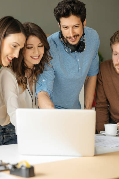 istock Happy Businesspeople Working Together 1204422055