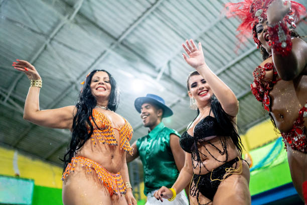 people celebrating and dancing brazilian carnival at school carnival - political party concepts glamour friendship imagens e fotografias de stock